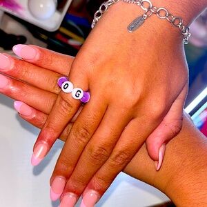 This is a handmade Olivia Rodrigo beaded ring.